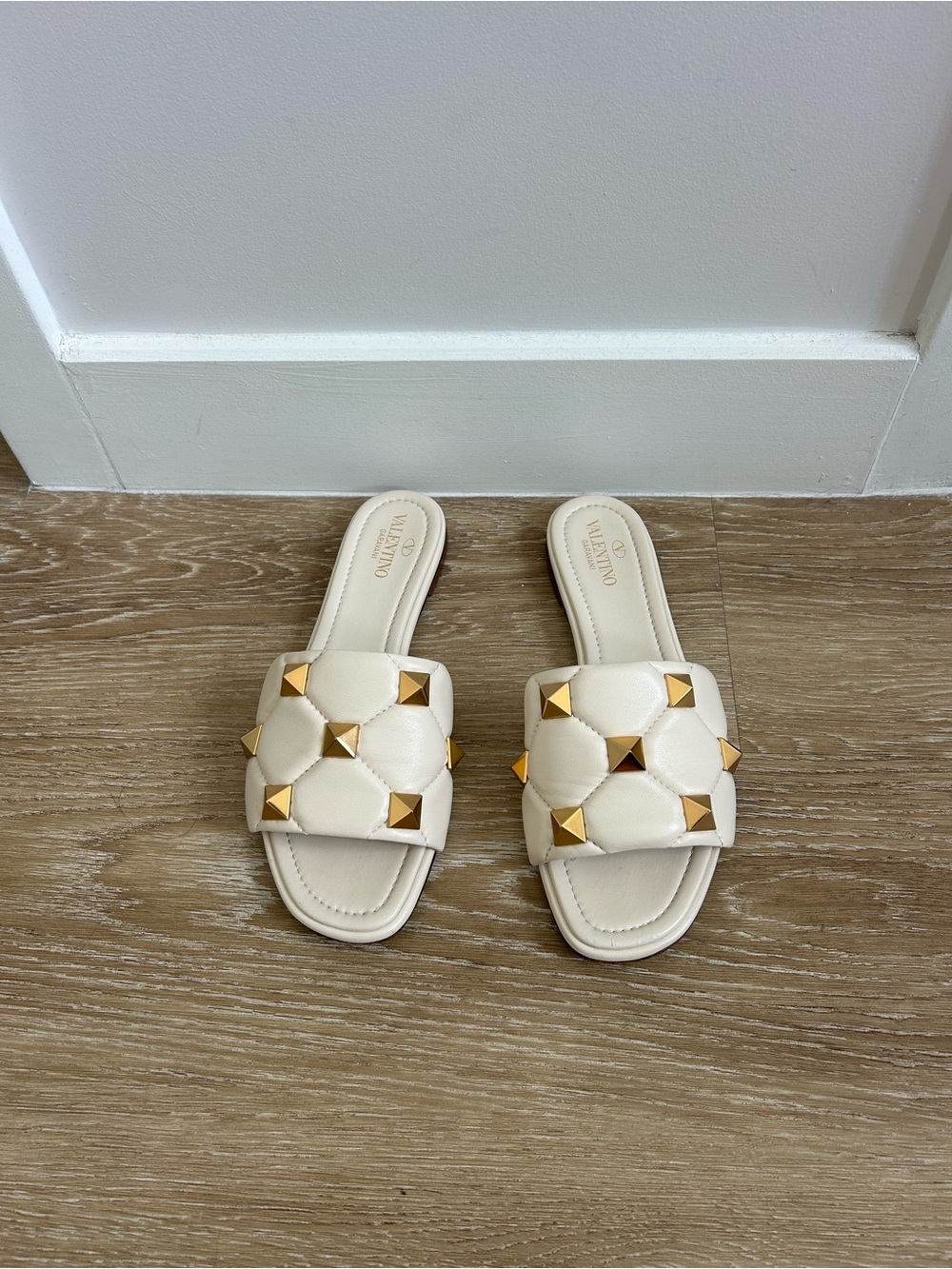 Valentino Garavani Ivory Quilted Slide Mules with Gold Rockstuds